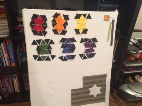 triangles on design board, partially sewn together